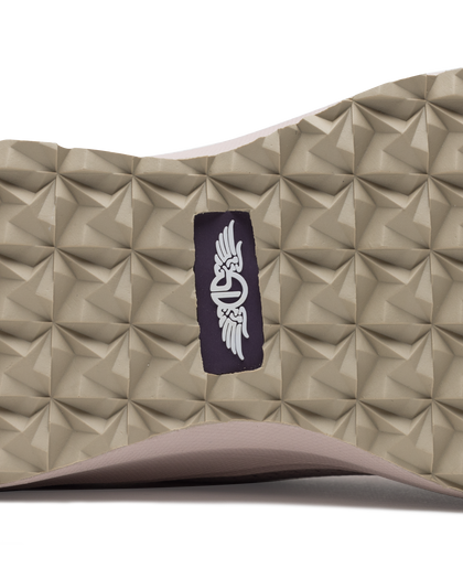 Swing Shoe in Rosewine, close-up bottom view featuring the tan geometric traction outsole with Straight Down navy logo label at the center and blush midsole edge