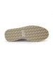 Bella Perforated Derby Shoe in White, bottom sole view showing the tan pyramid-textured traction outsole with Straight Down logo label at the center