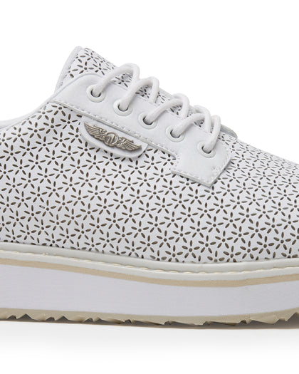 Bella Perforated Derby Shoe in White, close-up side view highlighting the all-over perforated floral cutout pattern, white laces, and silver Straight Down logo badge on the upper with a white platform sole