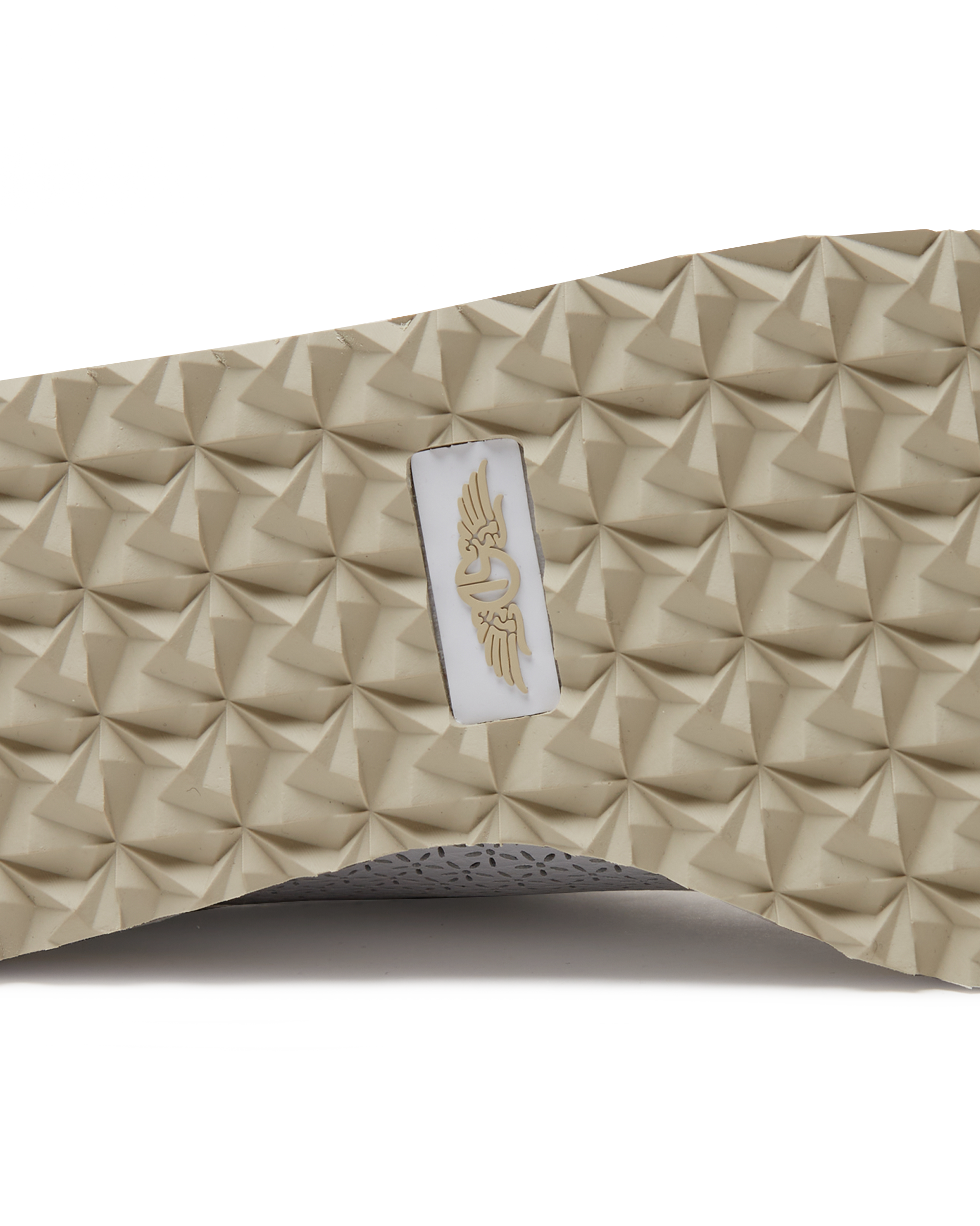 Bella Perforated Derby Shoe in White, close-up sole view highlighting the tan pyramid-textured traction outsole with Straight Down logo label at the center