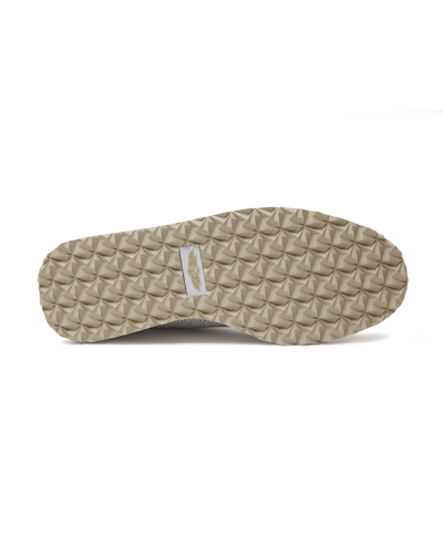 Bella Perforated Derby Shoe in White, bottom sole view showing the tan pyramid-textured traction outsole with Straight Down logo label at the center