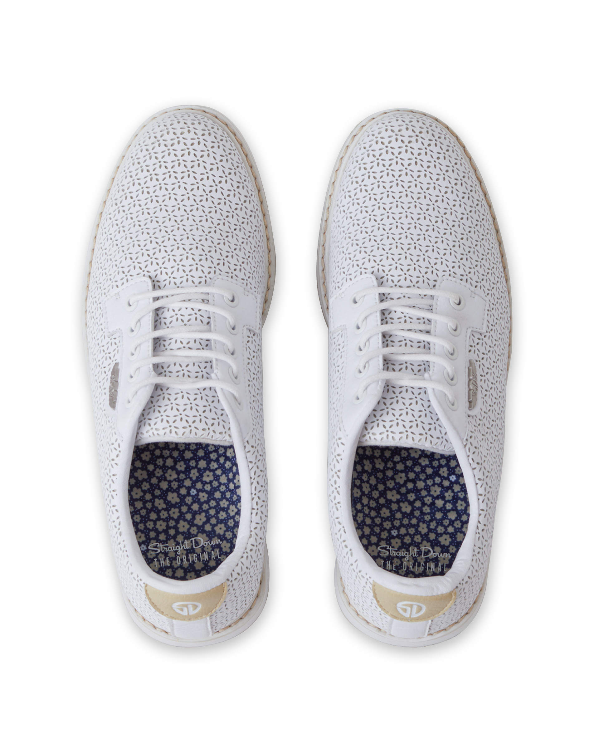 Bella Perforated Derby Shoe in White, top down view of both shoes featuring the all-over perforated floral cutout pattern on a white upper with white laces and a navy floral printed insole with Straight Down branding
