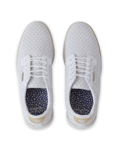 Bella Perforated Derby Shoe in White, top down view of both shoes featuring the all-over perforated floral cutout pattern on a white upper with white laces and a navy floral printed insole with Straight Down branding