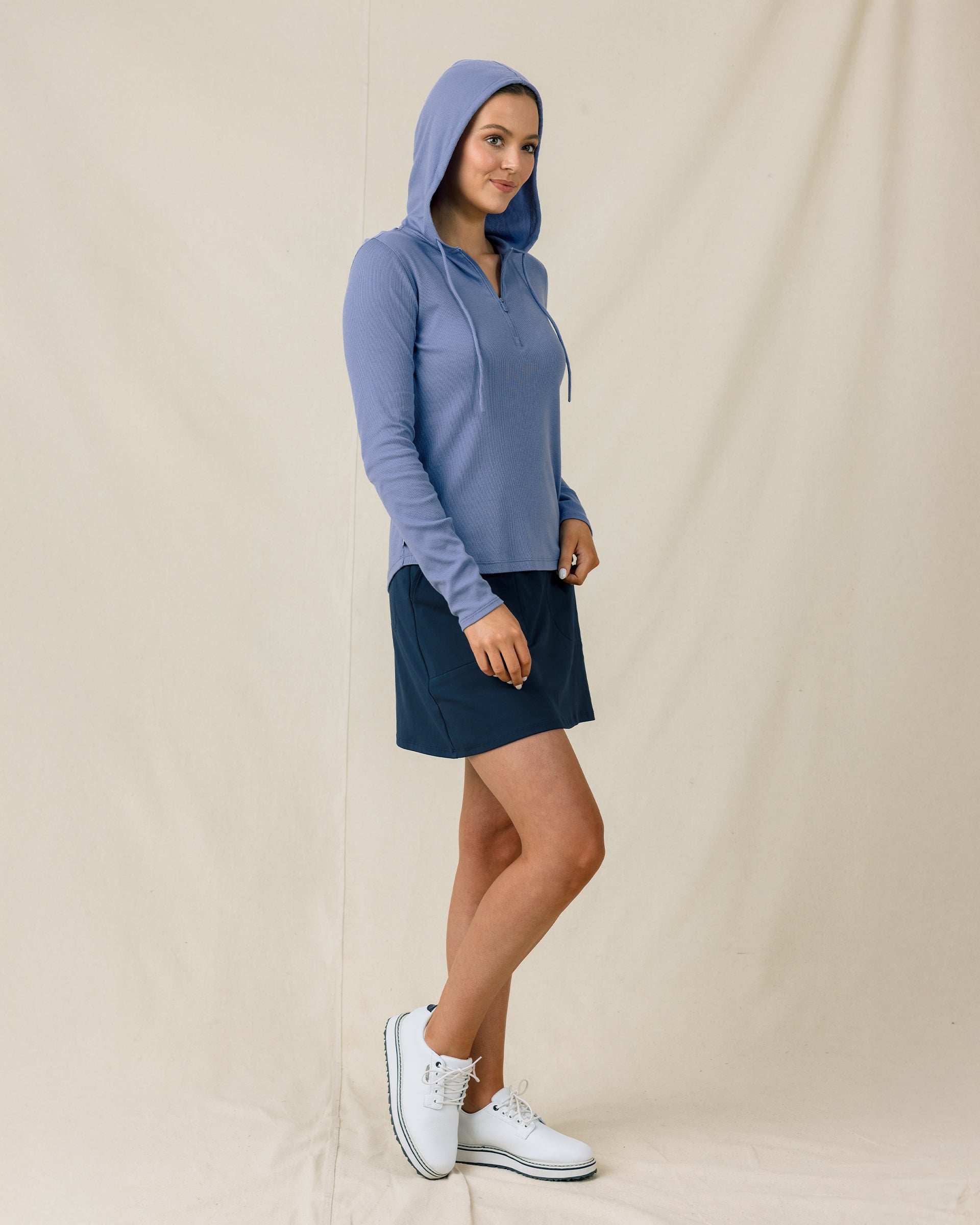 Thyme Quarter Zip Hoodie in Tidal with ribbed stretch fabric, hood up side view