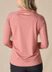 Women's Anza Quarter Zip in Cedar, back model view featuring a heathered rose long-sleeve pullover with tonal contrast stitching along the raglan seams and a Straight Down logo embroidered at the upper back collar