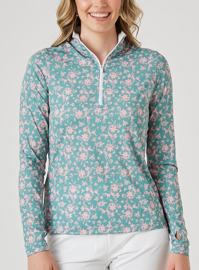 Women's Ava Quarter Zip in Sea Green, front model close-up view featuring a teal long-sleeve pullover with an all-over pink floral vine print, a quarter-zip closure, and a white interior collar lining