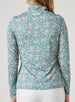 Women's Ava Quarter Zip in Sea Green, back model view featuring a teal long-sleeve pullover with an all-over pink floral vine print and a Straight Down logo embroidered at the upper back collar