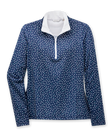 Women's Galaxy Quarter Zip in New Indigo, flat lay front view featuring an allover scattered polka dot print in white and teal on a navy base with a quarter zip closure and stand-up collar