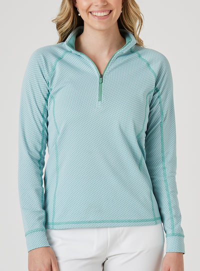 Witney Quarter Zip in Sea Green, front view on model featuring a light aqua and white houndstooth print with contrast green stitching and quarter zip neckline
