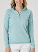Witney Quarter Zip in Sea Green, front view on model featuring a light aqua and white houndstooth print with contrast green stitching and quarter zip neckline