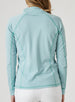 Witney Quarter Zip in Sea Green, back view on model featuring a light aqua and white houndstooth print with contrast green stitching and center back seam detail