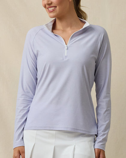 Model wearing the Clara Quarter Zip in Cosmic Blue, front view