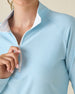 Clara Quarter Zip in Gemstone, close-up detail view featuring the white quarter zip and white contrast collar lining on a solid light blue pullover