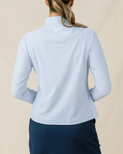Mylite Quarter Zip in Lake blue with textured stretch fabric, back model view