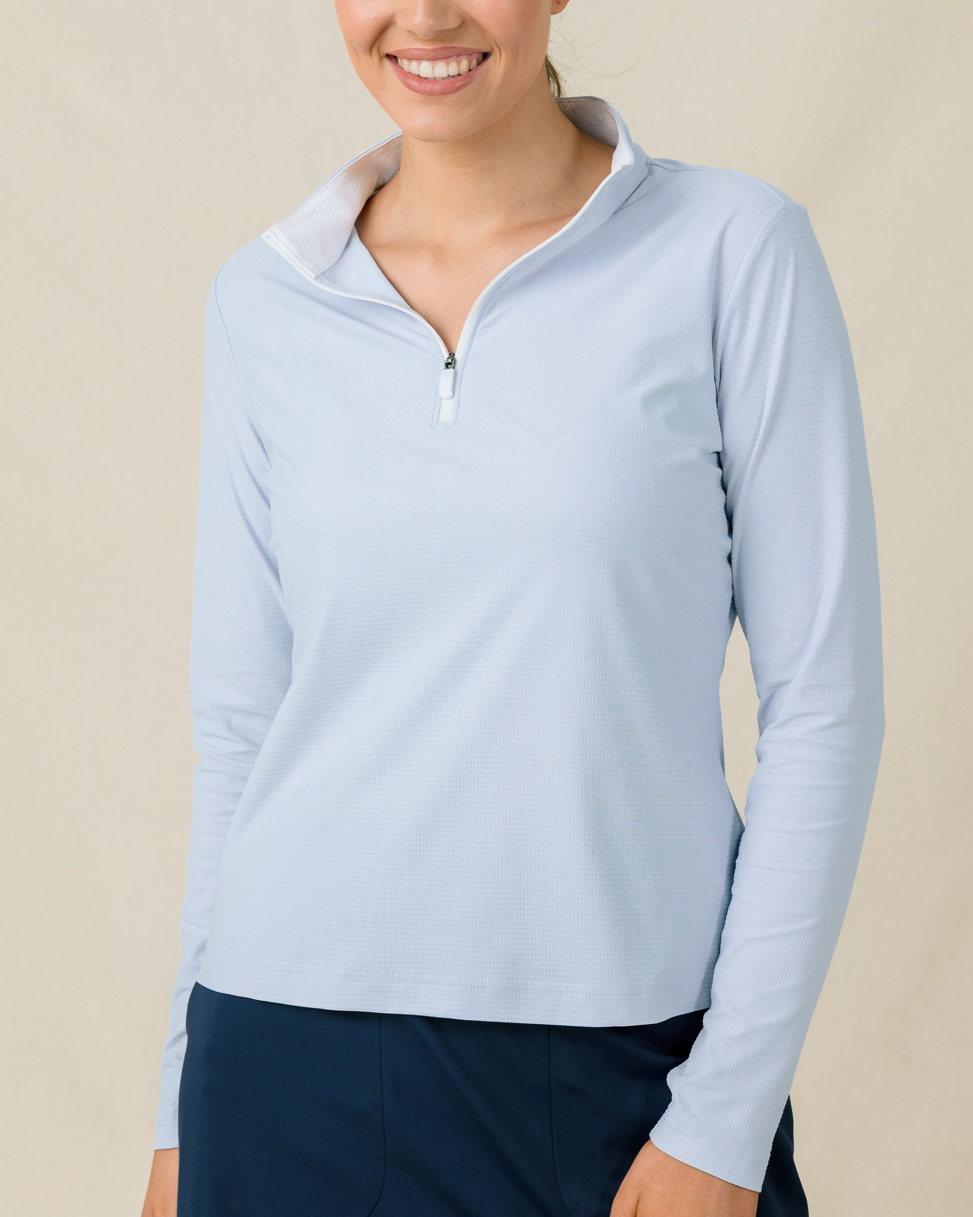 Mylite Quarter Zip in Lake blue with textured stretch fabric, zipper detail view