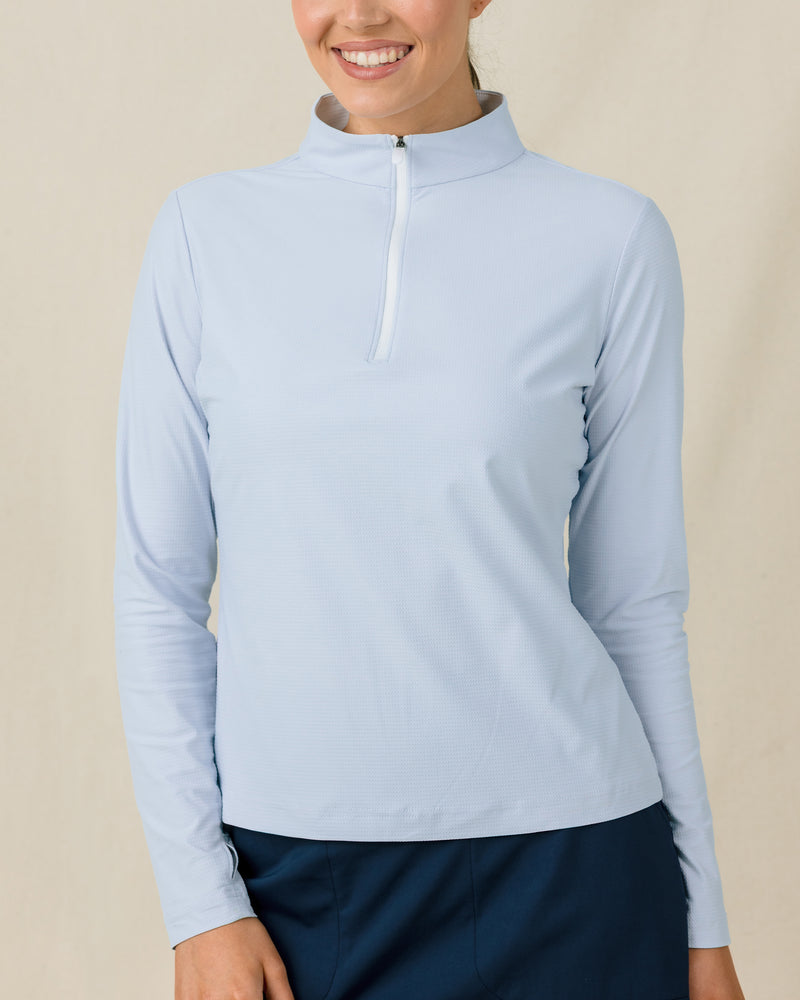 Mylite Quarter Zip in Lake blue with textured stretch fabric, front model view