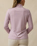 Back view of the Empress Quarter Zip in Pink Dawn featuring an allover geometric floral print and logo just below the collar