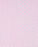 A close-up of a light pink fabric or material with a repeating pattern of small white and dark navy dots.