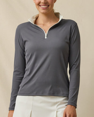 Front view of a woman wearing the Skyler Quarter Zip in Nightshade, showing the ribbed texture, cream contrast collar, and quarter-zip neckline.