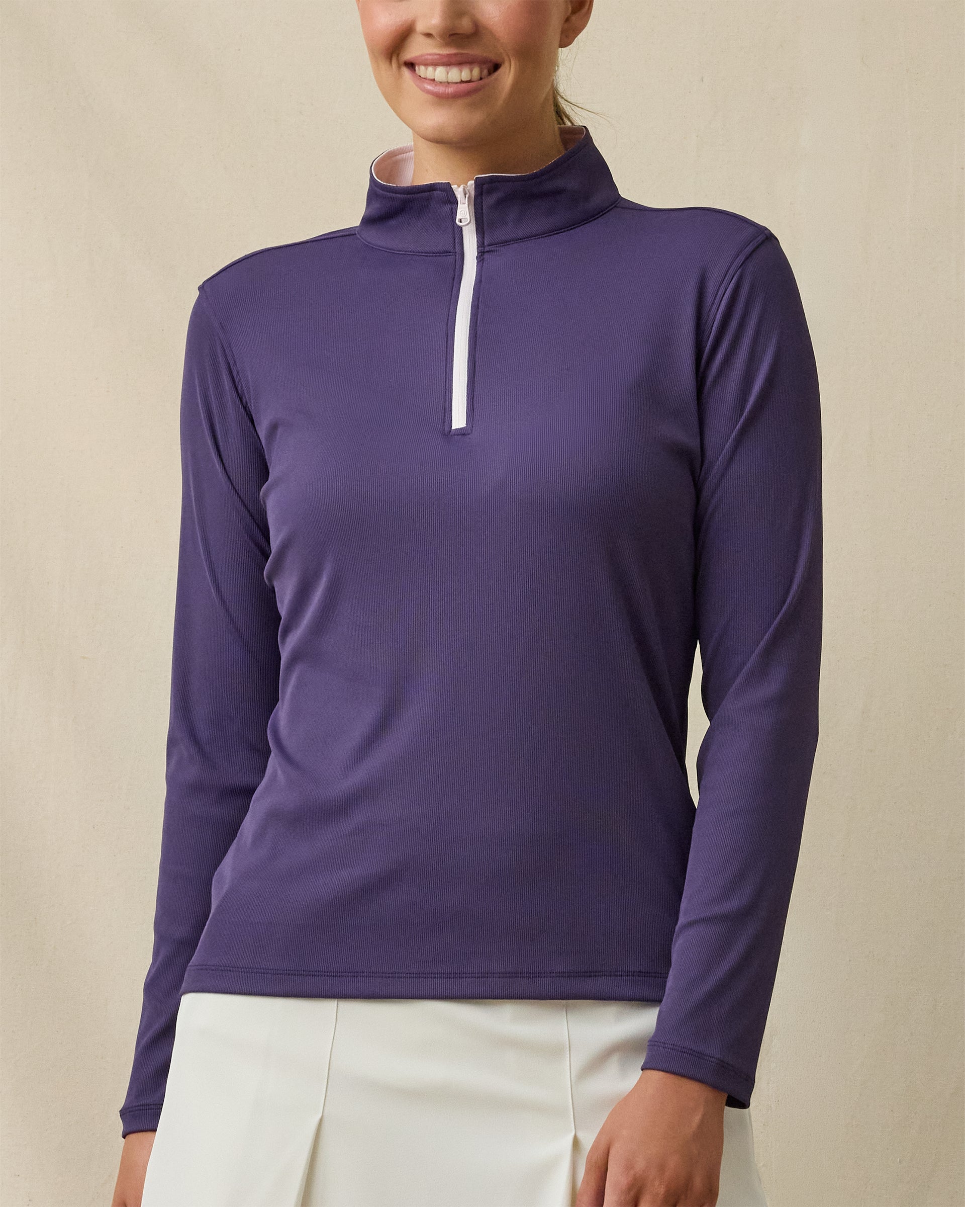 Model wearing the Skyler Quarter Zip in Blackcurrant purple