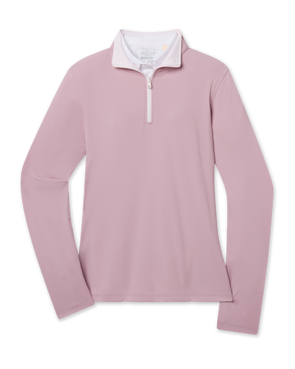 Skyler Quarter Zip in Pink Dawn featuring a soft pink hue, long sleeves, and contrast white quarter-zip closure