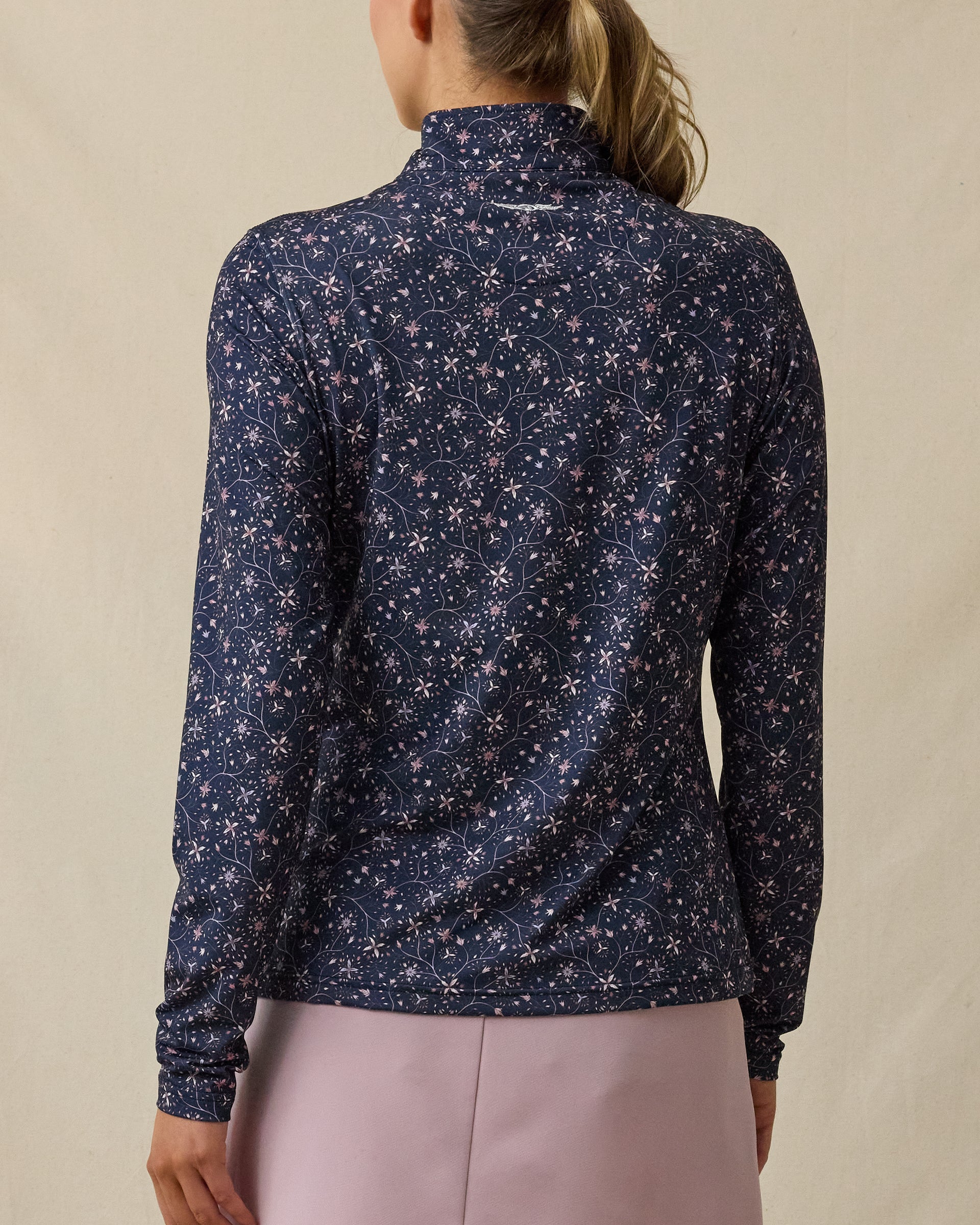 Back view of the Erika Quarter Zip in New Indigo featuring an allover floral vine print
