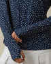 Sprinkles Quarter Zip in New Indigo, sleeve and print detail