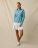 Huli Quarter Zip in Tidal Blue, full outfit model view styled with white golf skort, collar open