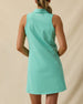 Greta Dress in Cascade Green with sleeveless zip collar design, back model view