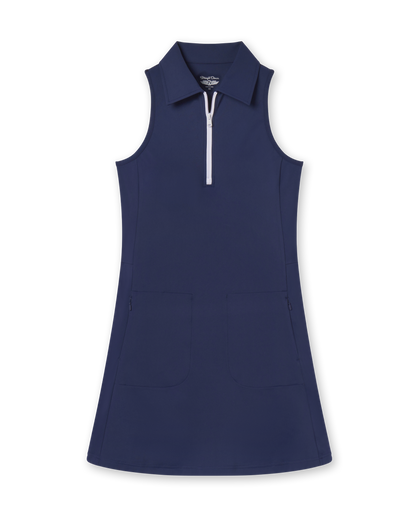 Women's Greta Dress in New Indigo, flat lay front view featuring a solid sleeveless construction with a quarter zip white closure, spread collar, and zip side pockets