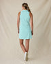 Women's Greta Dress in Green Stone, full-length back on-model view featuring a solid mint green sleeveless polo dress with a spread collar and Straight Down logo embroidered at the upper back, paired with white shoes