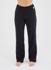 Misty Pant in Black, front on-model view featuring solid black wide-leg pants with a waffle knit texture and elastic waistband