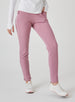 Women's Mavis Jogger in Peonie, front model view featuring a dusty rose waffle-knit jogger with elasticated waistband, side pocket, and ankle vent detail paired with a white long sleeve top and white athletic shoes