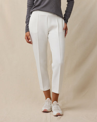 Model wearing the Straight Down Chelsea Pant in Coconut with a cropped straight-leg fit