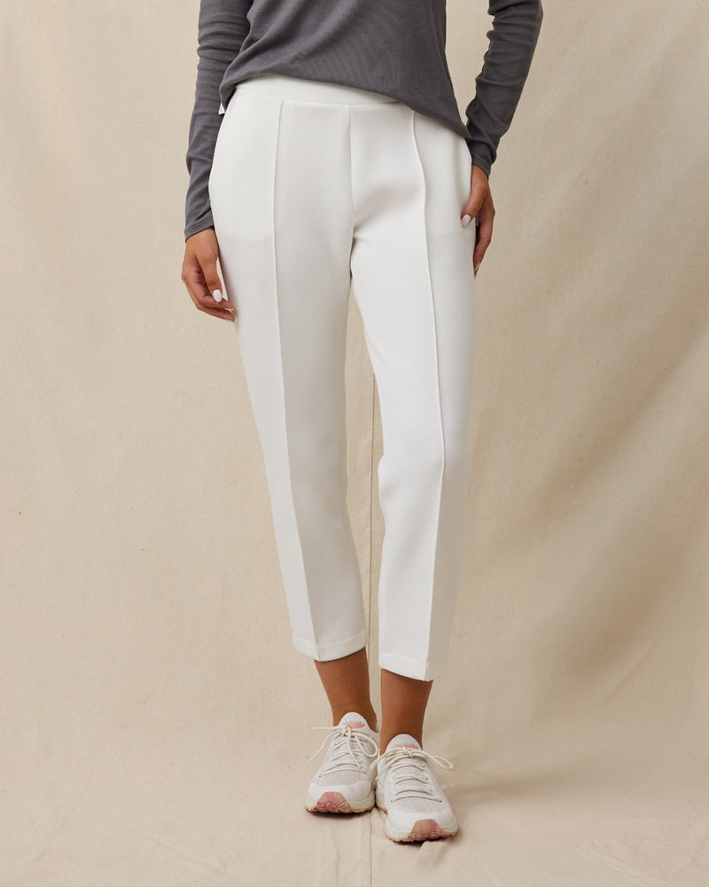 Model wearing the Straight Down Chelsea Pant in Coconut with a cropped straight-leg fit