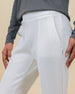 Close-up of the Straight Down Chelsea Pant in Coconut highlighting the front pintuck seam and side pocket