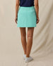 Korra Skort in Cascade Green, back view with welt pockets and embroidered logo