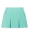 Korra Skort in Cascade Green with pleated front and side pockets, front view