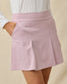 Close-up of the Korra Skort in Pink Dawn highlighting the front pleats and side pocket
