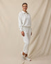 Model wearing the Harper Quarter Button in Coconut with matching scuba knit pants