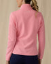 Women's Swing Jacket in Geranium, back view on model featuring a pink full zip jacket with a ribbed texture and Straight Down logo at the upper back, paired with navy pants