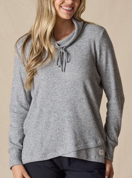  Women's Misty Top in Heather, front  view on model featuring a heather gray waffle knit long sleeve top with cowl neck and drawstring tie