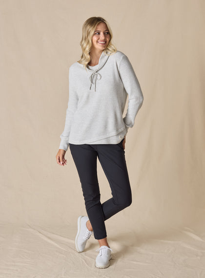 Women's Misty Top in New Heather, full length front view on model featuring a heather gray waffle knit long sleeve top with cowl neck and drawstring tie