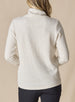 Women's Misty Top in Oatmeal, back view on model featuring a cream waffle knit long sleeve top with cowl neck
