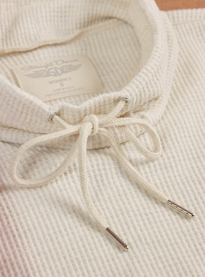 Women's Misty Top in Oatmeal, close detailed view of the cream waffle knit cowl neck and drawstring tie with silver aglets
