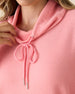 Misty Top in Spritz, close-up detail view featuring the waffle knit texture and cowl neck with drawstring and silver aglet tips