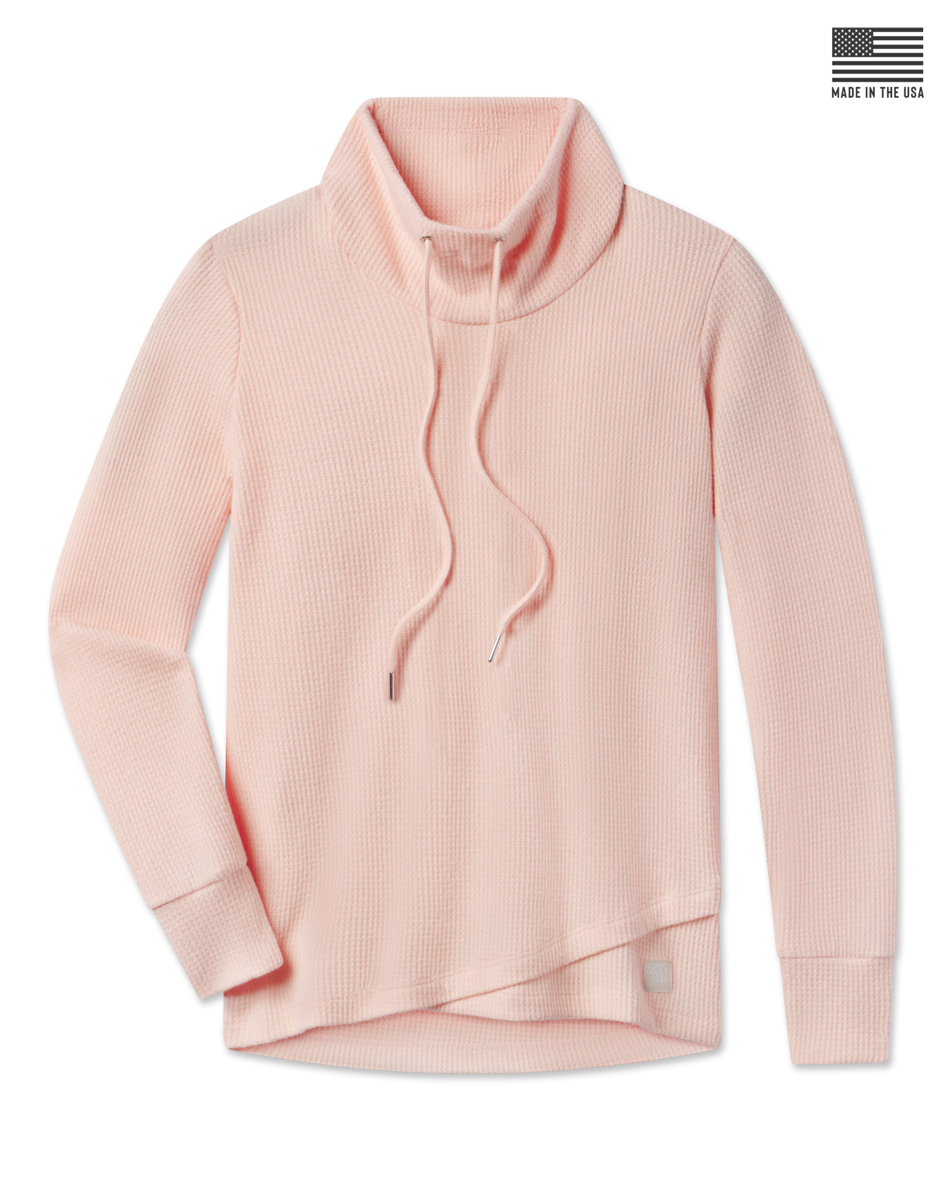 A light peach waffle-knit mock neck sweater with a drawstring.