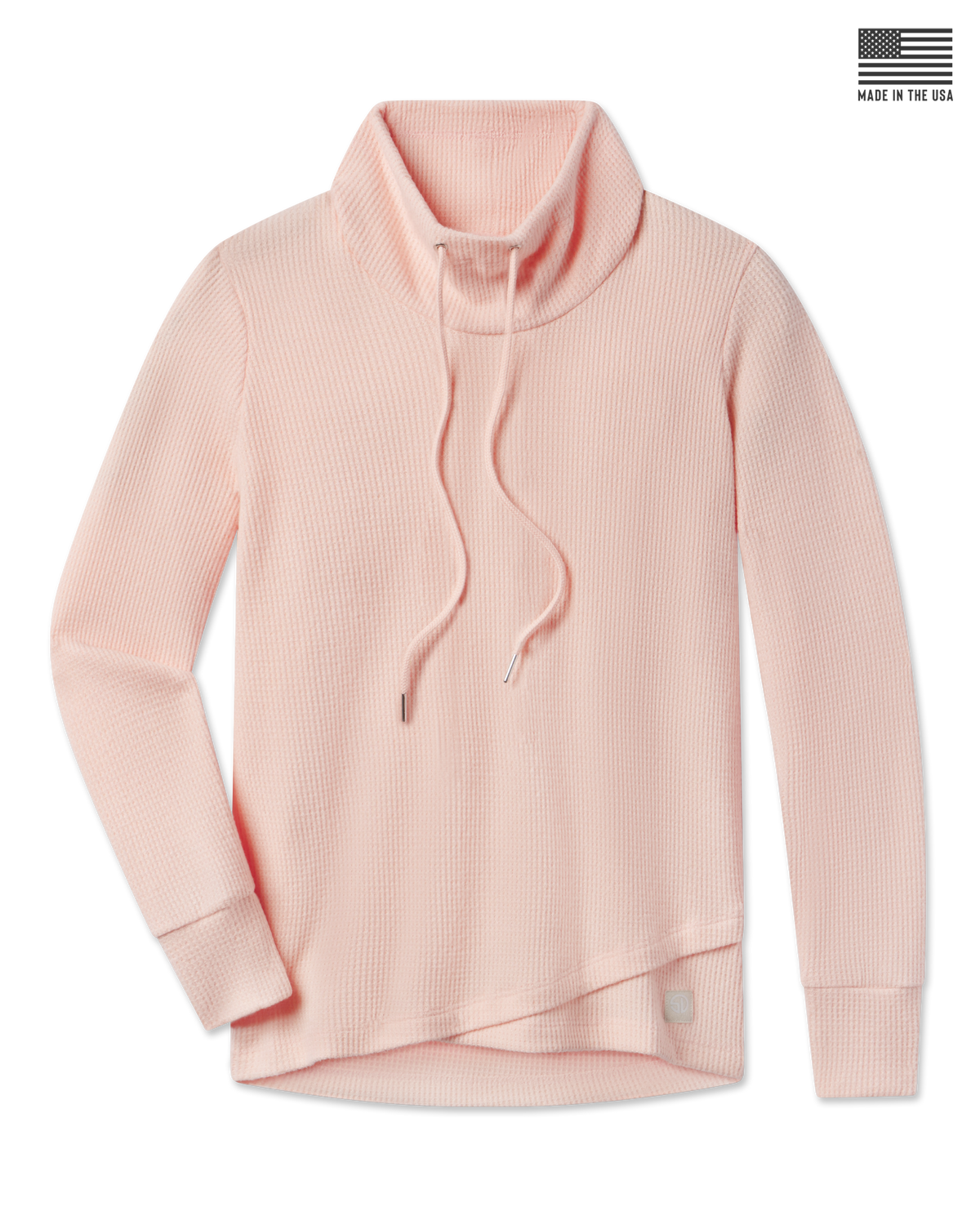 A light peach waffle-knit mock neck sweater with a drawstring.