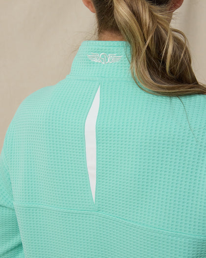 Opal Half Zip in Cascade Green, back vent and logo detail