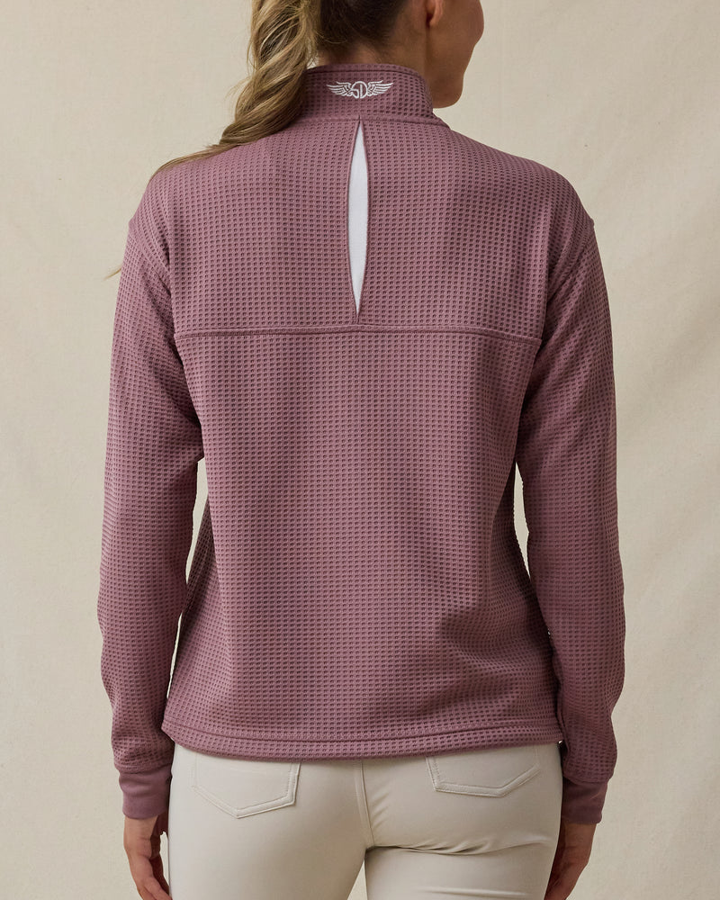 Back view of the Straight Down Opal Half Zip in Oxblood Red showcasing the textured waffle knit fabric, vented back opening, and embroidered logo at the collar
